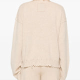 Tan top worn by a person, showing the top fit