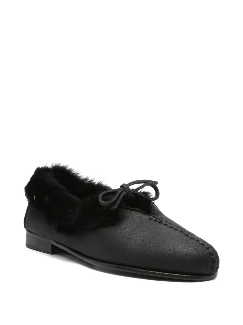 Black loafer, side view