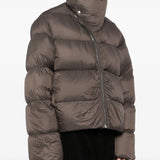 Grey jacket worn by a person, showing the jacket fit