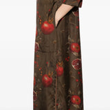 Close up of the brown dress, showing texture of the viscose and cupro fabric