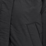 Close up of black jackets, showing texture of the wool and polyester fabric