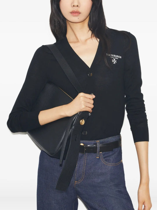 Black bag worn by a person, showing the bag's fit