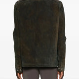 Green jacket worn by a person, showing the jacket's fit