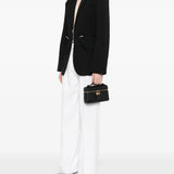 Black bag worn by a person, showing the bag's fit