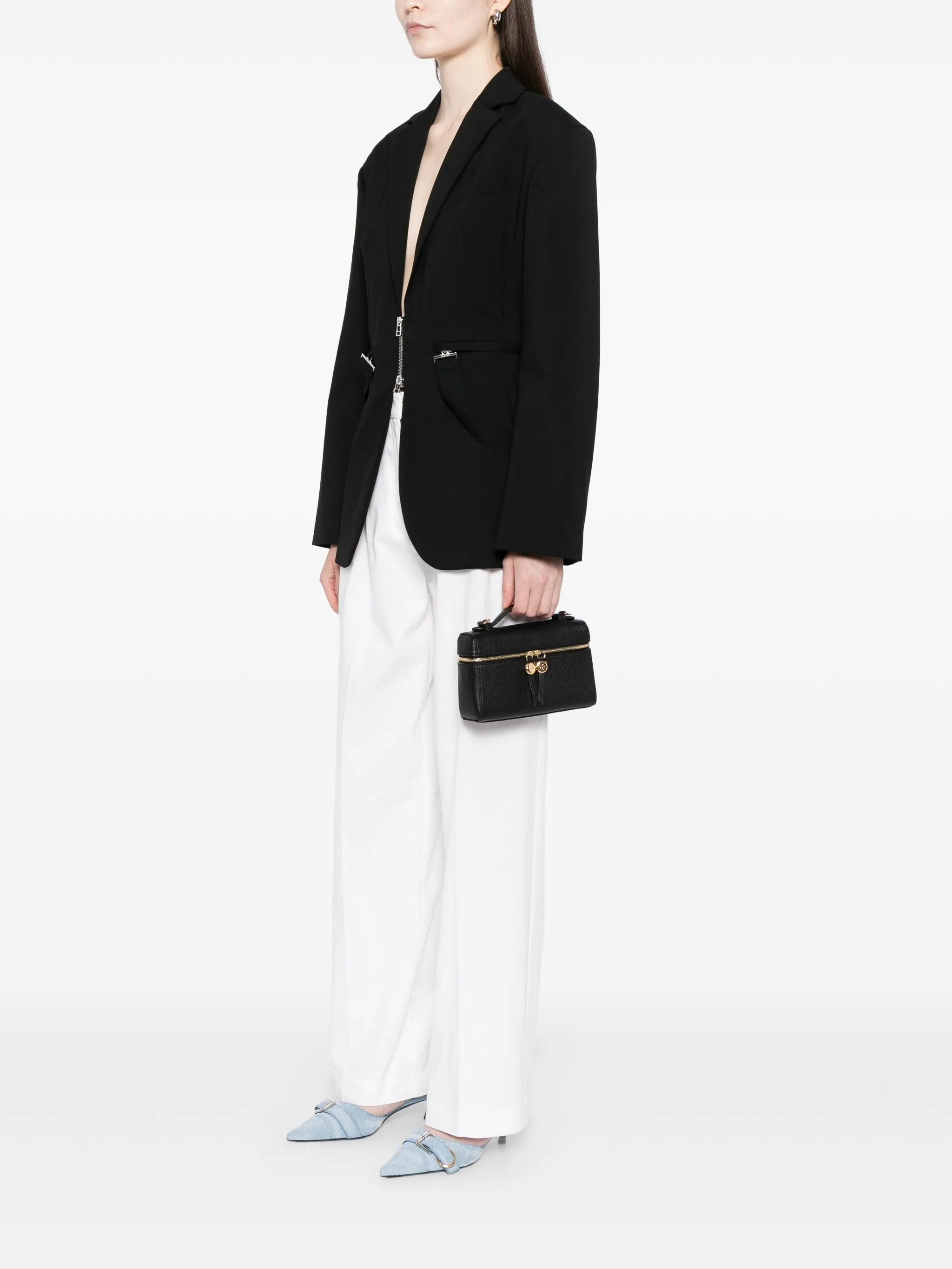 Black bag worn by a person, showing the bag's fit