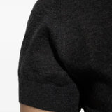 Close up of black sweater, showing texture of the cashmere fabric