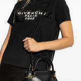 Black bags worn by a person, showing the bags fit