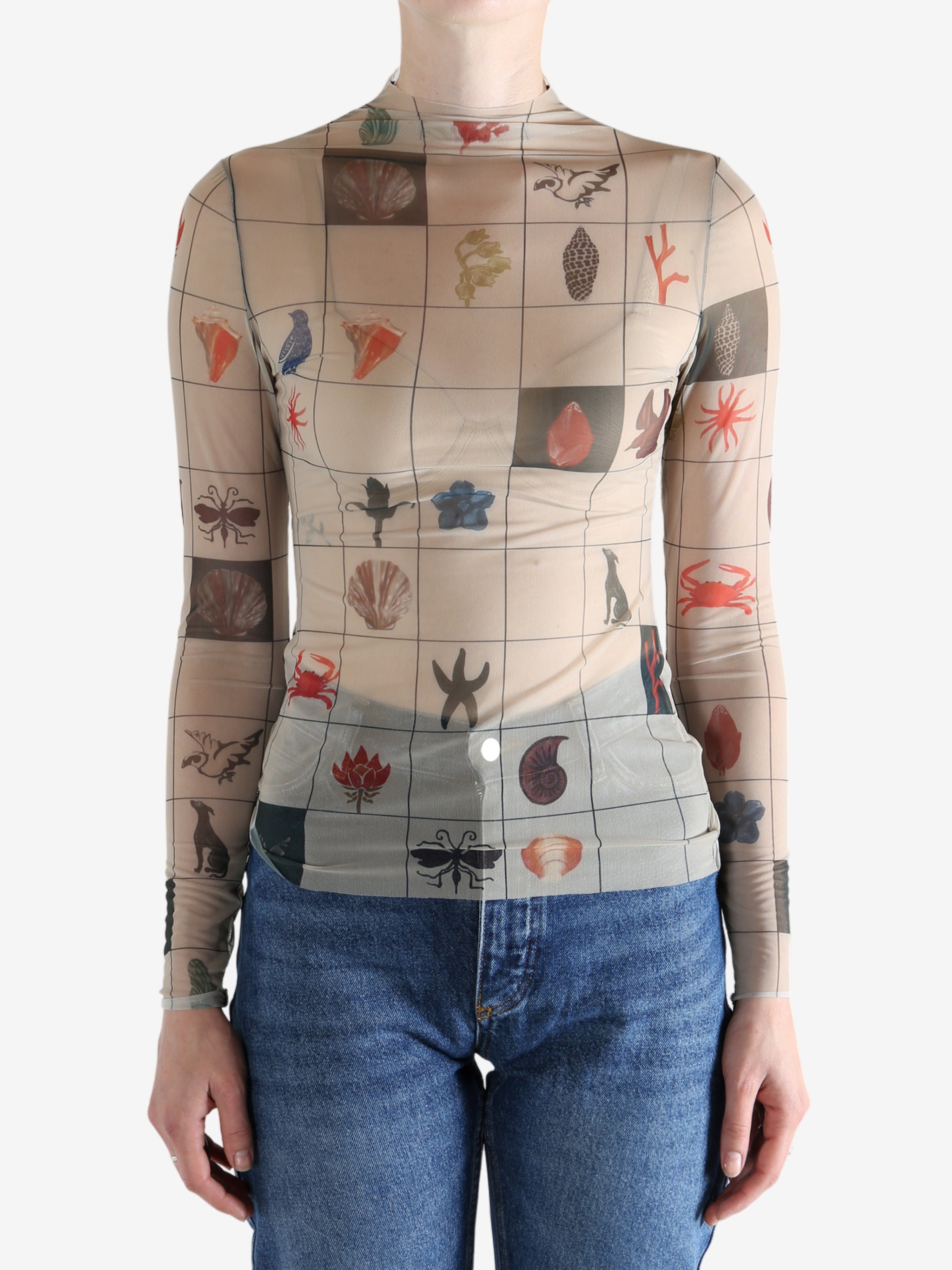 Tan top worn by a person, showing the top's fit