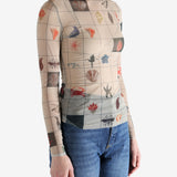 Tan top worn by a person, showing the top's fit