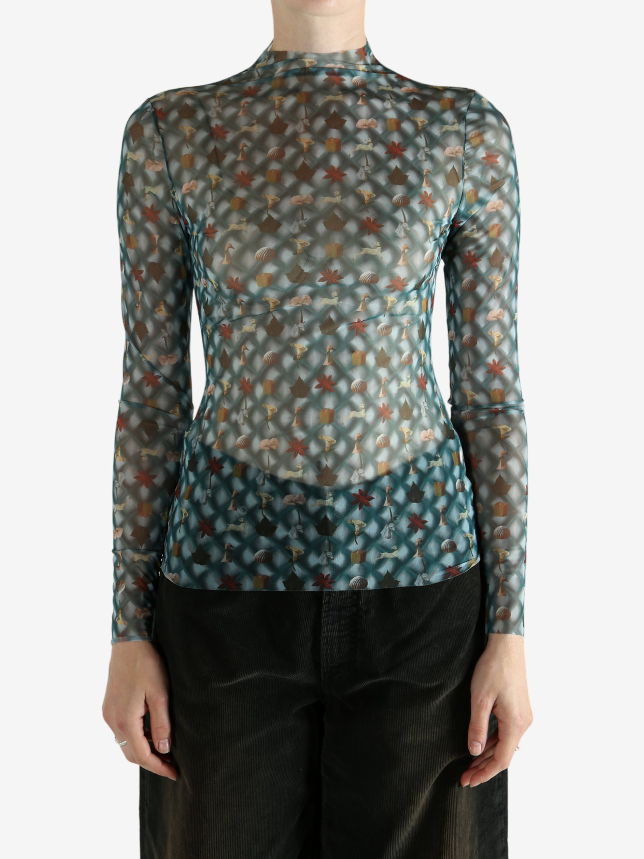 Blue top worn by a person, showing the top's fit