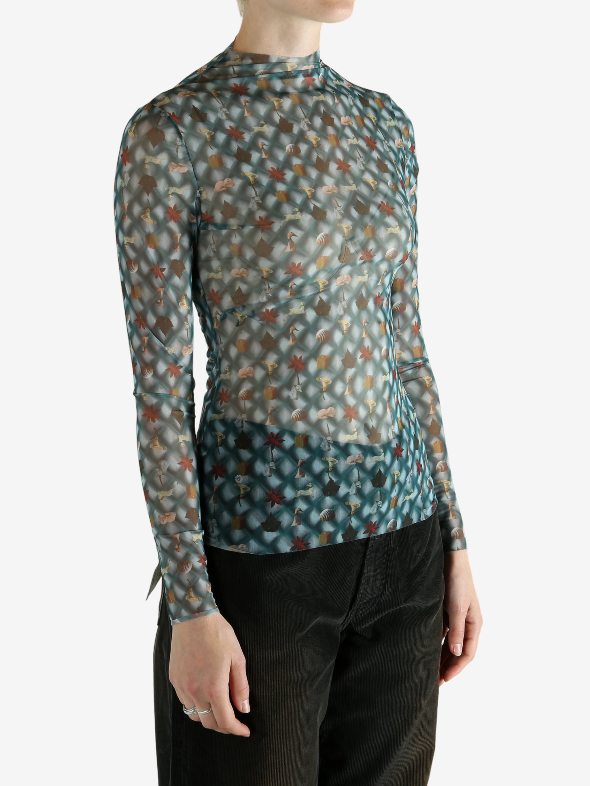 Blue top worn by a person, showing the top's fit