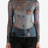 Blue top worn by a person, showing the top's fit