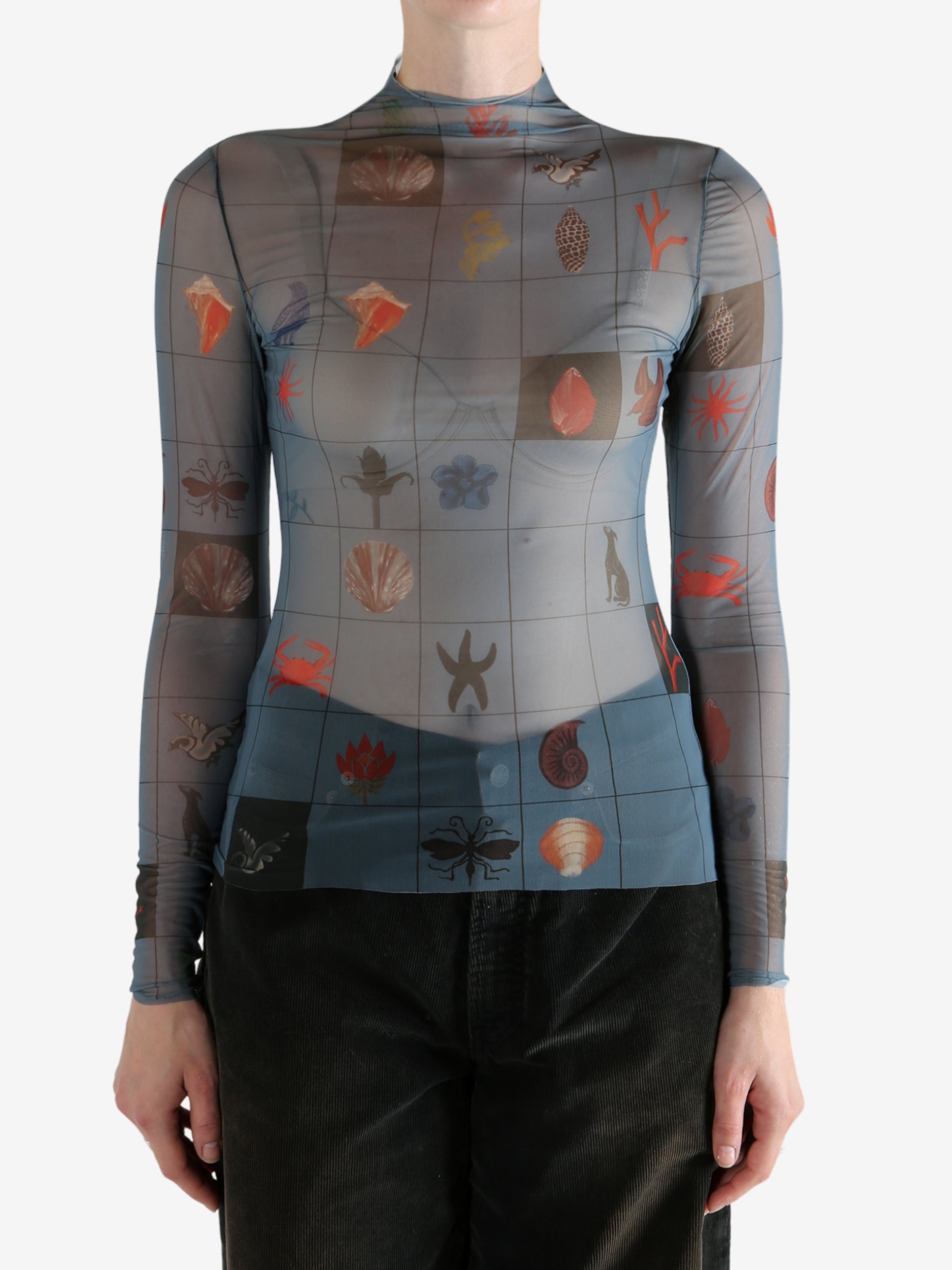 Blue top worn by a person, showing the top's fit