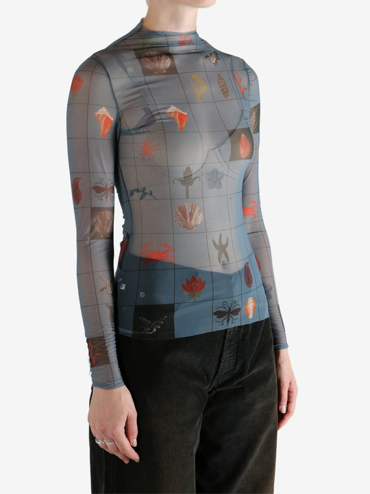 Blue top worn by a person, showing the top's fit