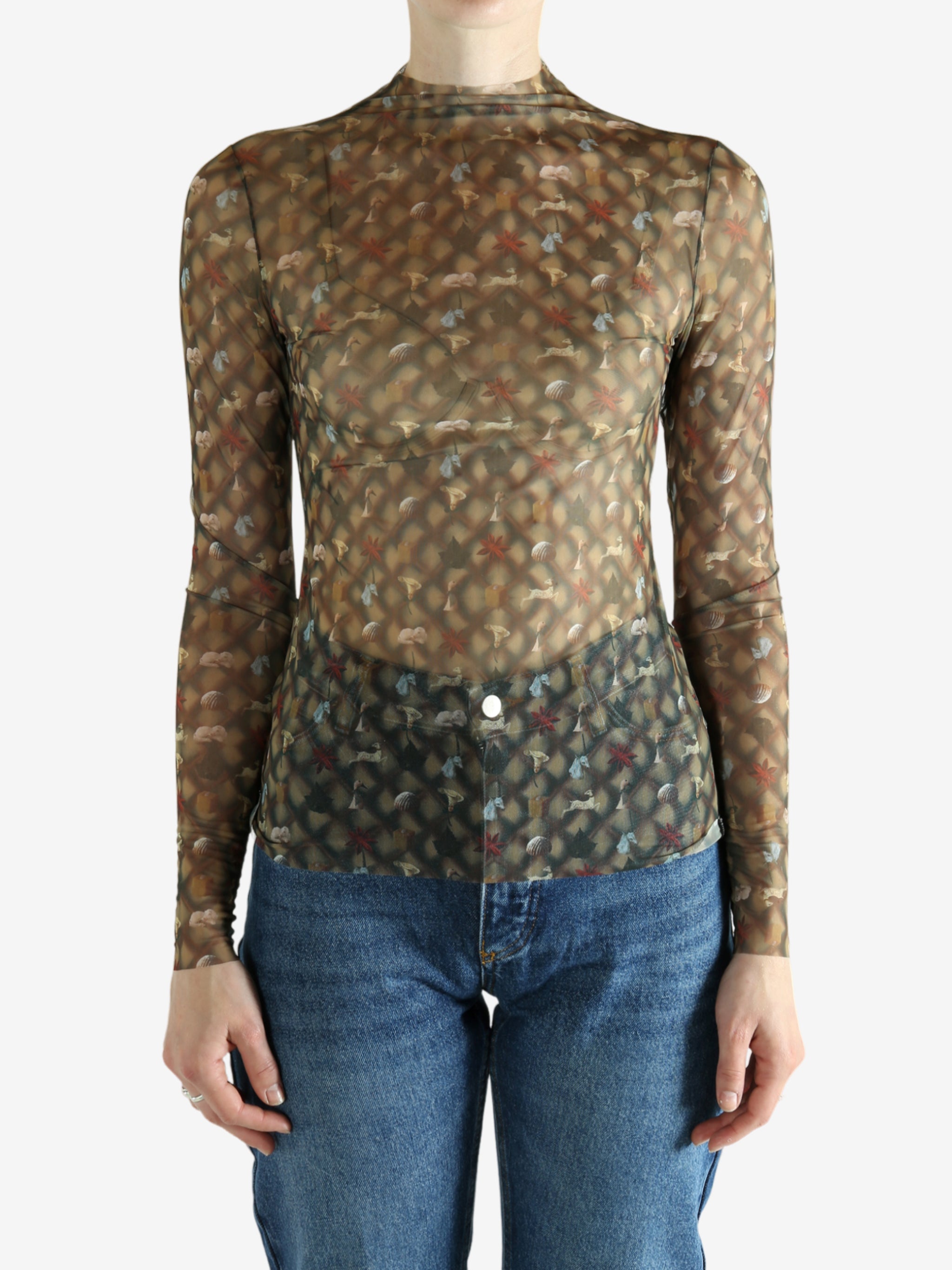 Brown top worn by a person, showing the top's fit