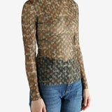 Brown top worn by a person, showing the top's fit