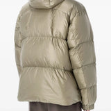 Tan jackets worn by a person, showing the jackets fit