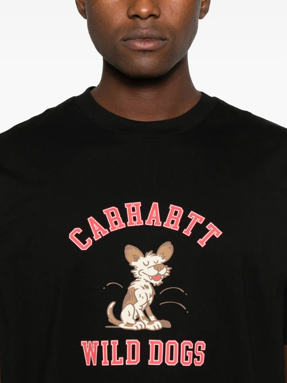 Close up of black t-shirts, showing texture of the cotton fabric