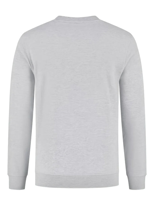 Grey knitwear, back view