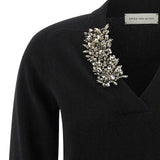 Close up of black sweater, showing texture of the cashmere fabric
