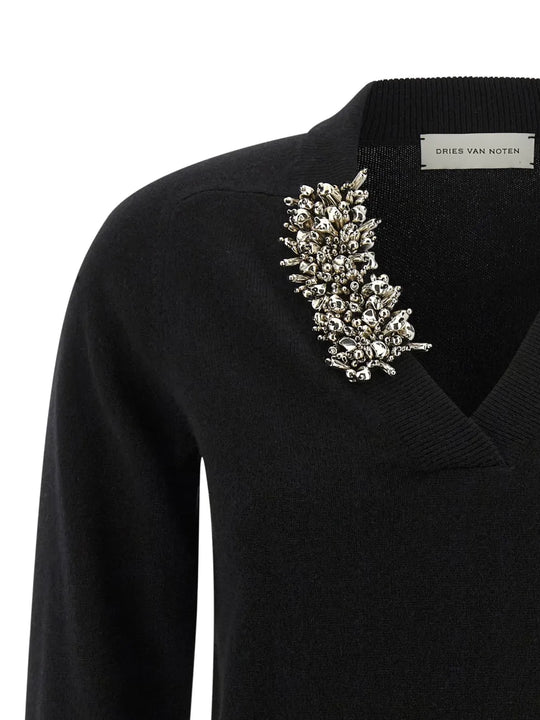 Close up of black sweater, showing texture of the cashmere fabric