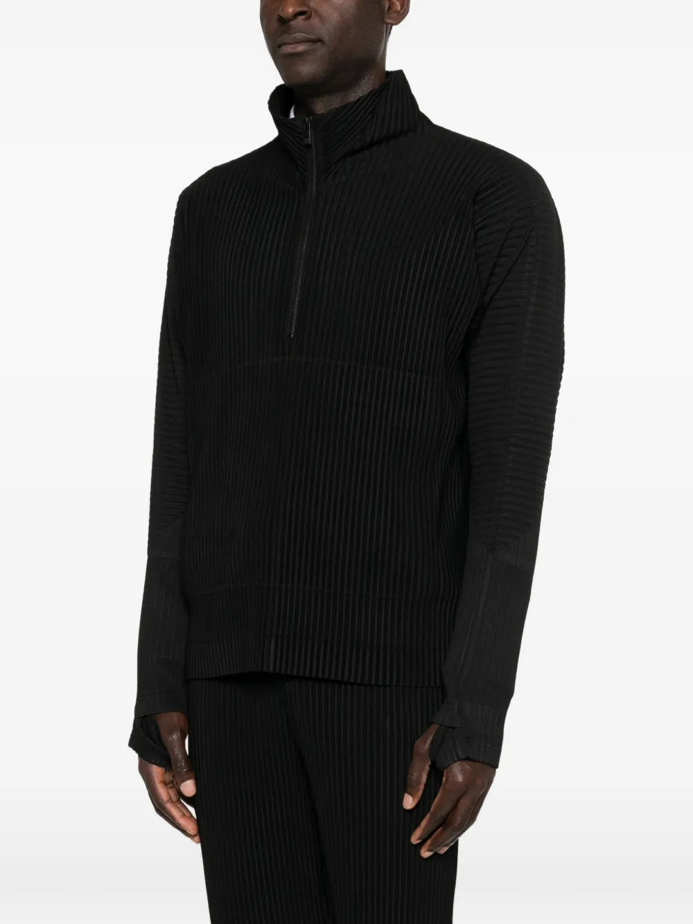 Black t-shirt worn by a person, showing the t-shirt's fit
