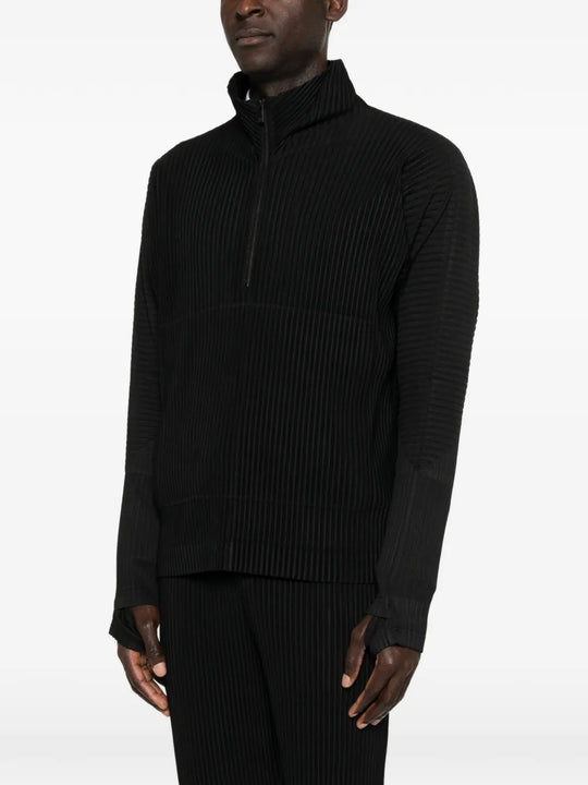 Black t-shirt worn by a person, showing the t-shirt's fit