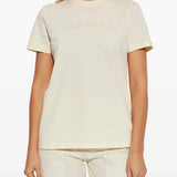 white t-shirt worn by a person, showing the t-shirt fit