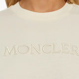 Close up of white t-shirt, showing texture of the Cotton fabric