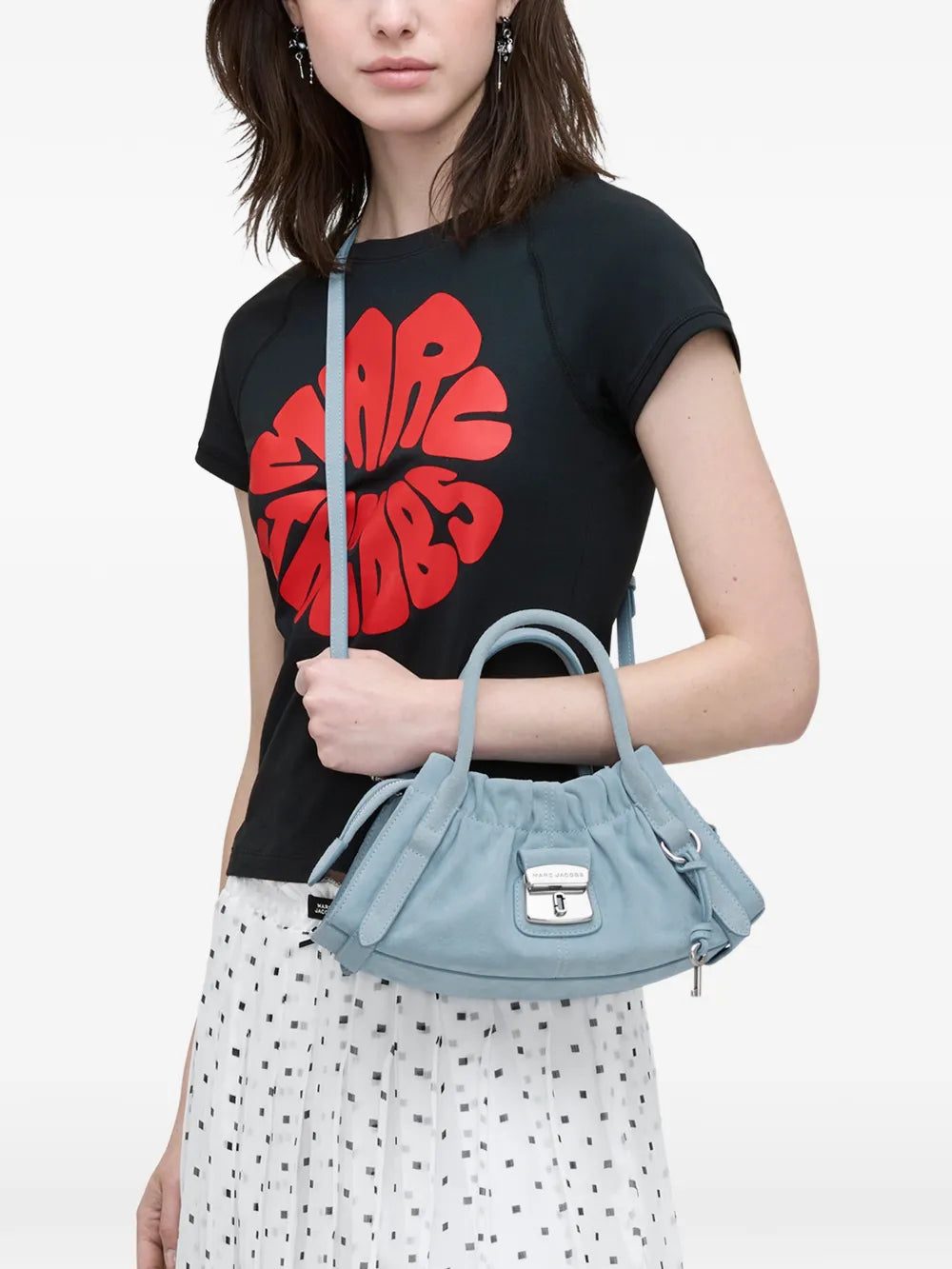 Blue bag worn by a person, showing the bag's fit