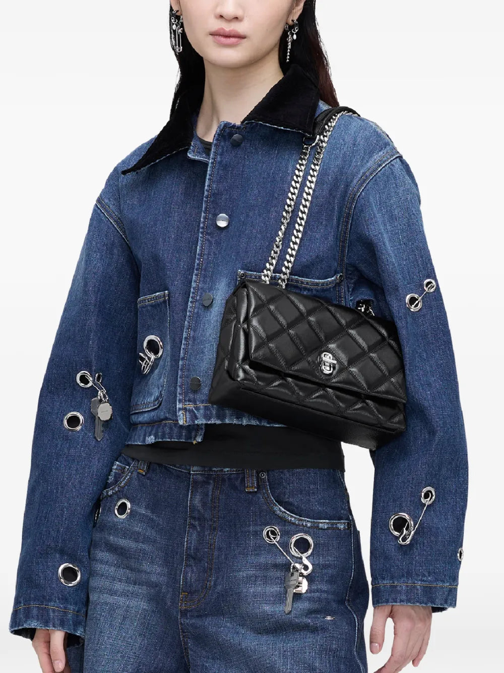 Black bags worn by a person, showing the bag's fit