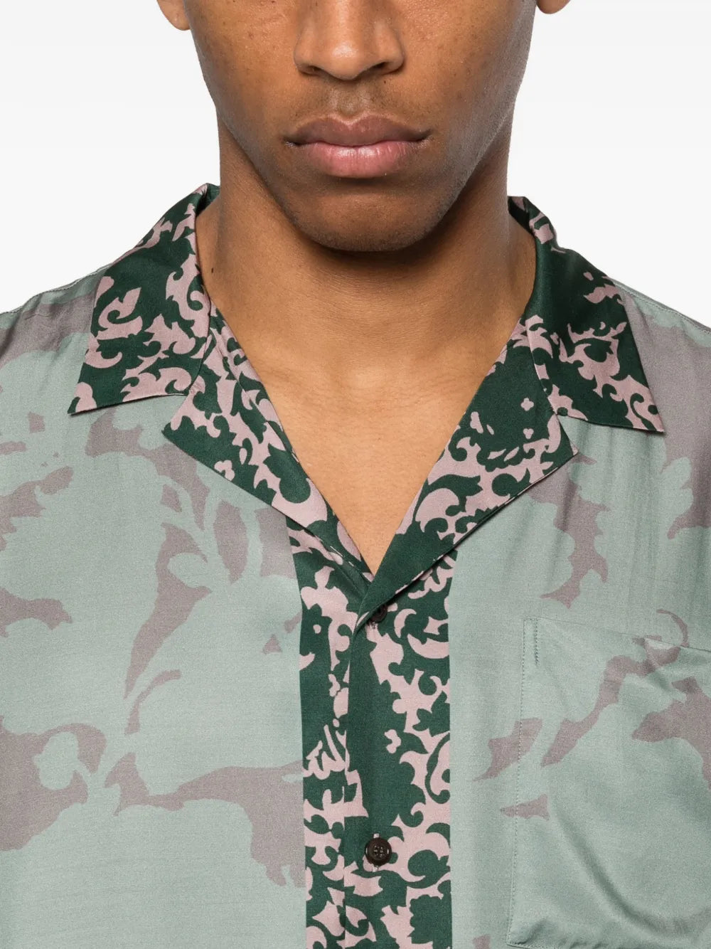 Close up of green shirt, showing texture of the viscose fabric