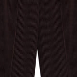 Close up of black pant, showing texture of the polyester fabric