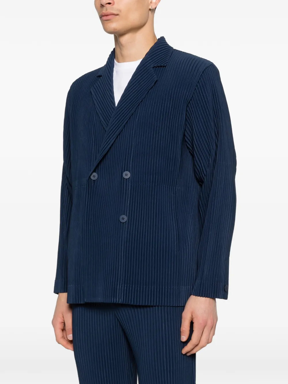 blue jackets worn by a person, showing the jackets fit