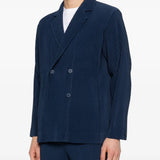 blue jackets worn by a person, showing the jackets fit