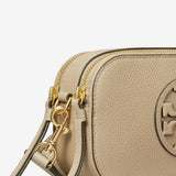 Close up of the tan bag, showing texture of the leather fabric