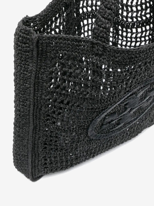Close up of the black bag, showing texture of the straw fabric