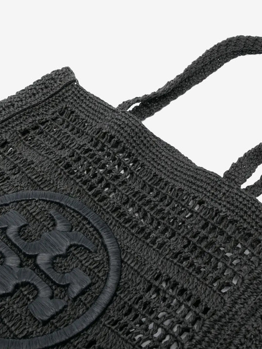 Close up of the black bag, showing texture of the straw fabric