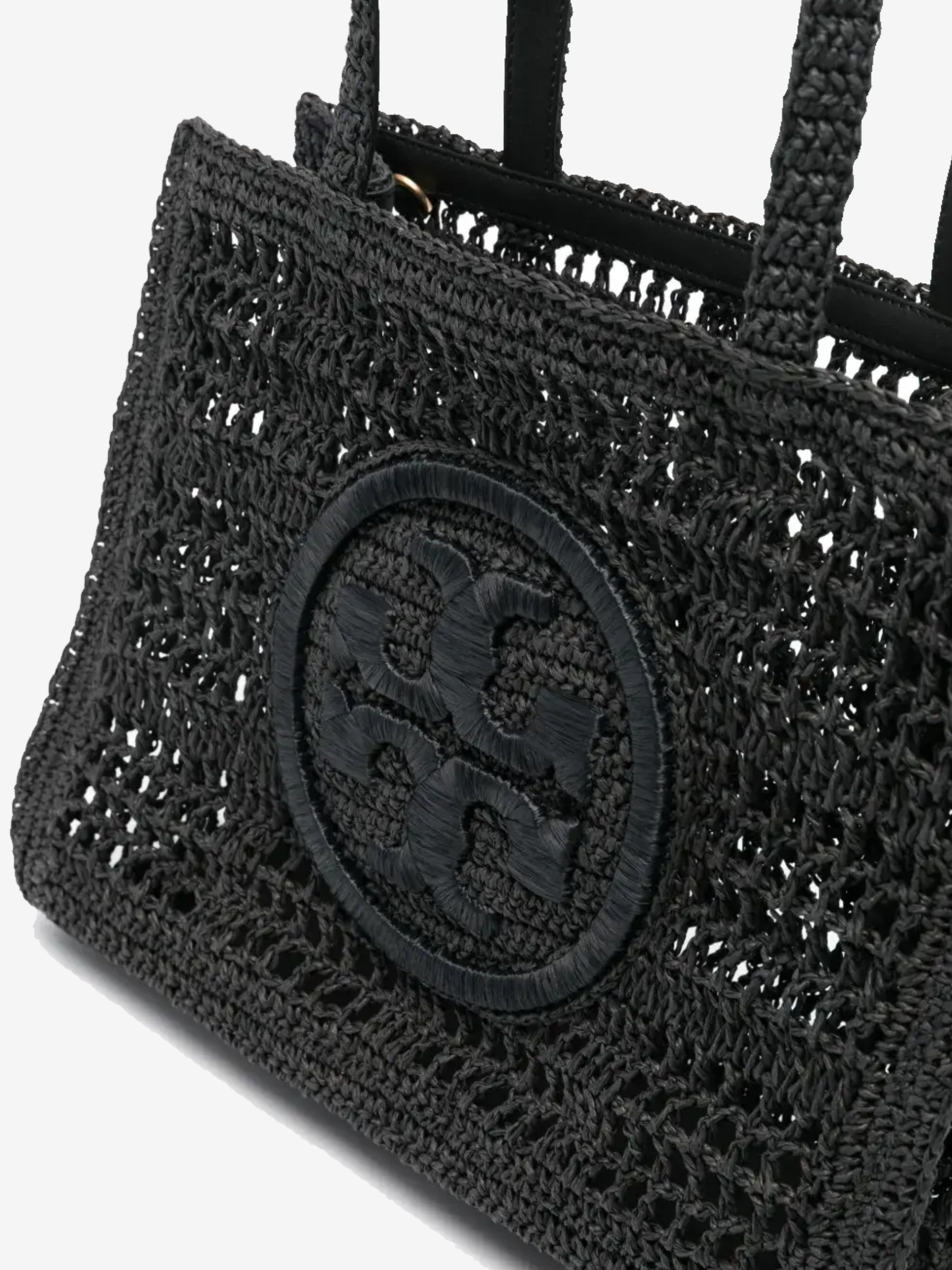 Close up of the black bag, showing texture of the straw fabric