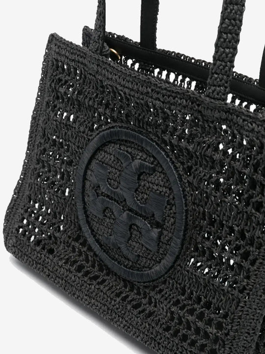 Close up of the black bag, showing texture of the straw fabric