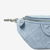 Close up of the blue bag, showing texture of the suede fabric