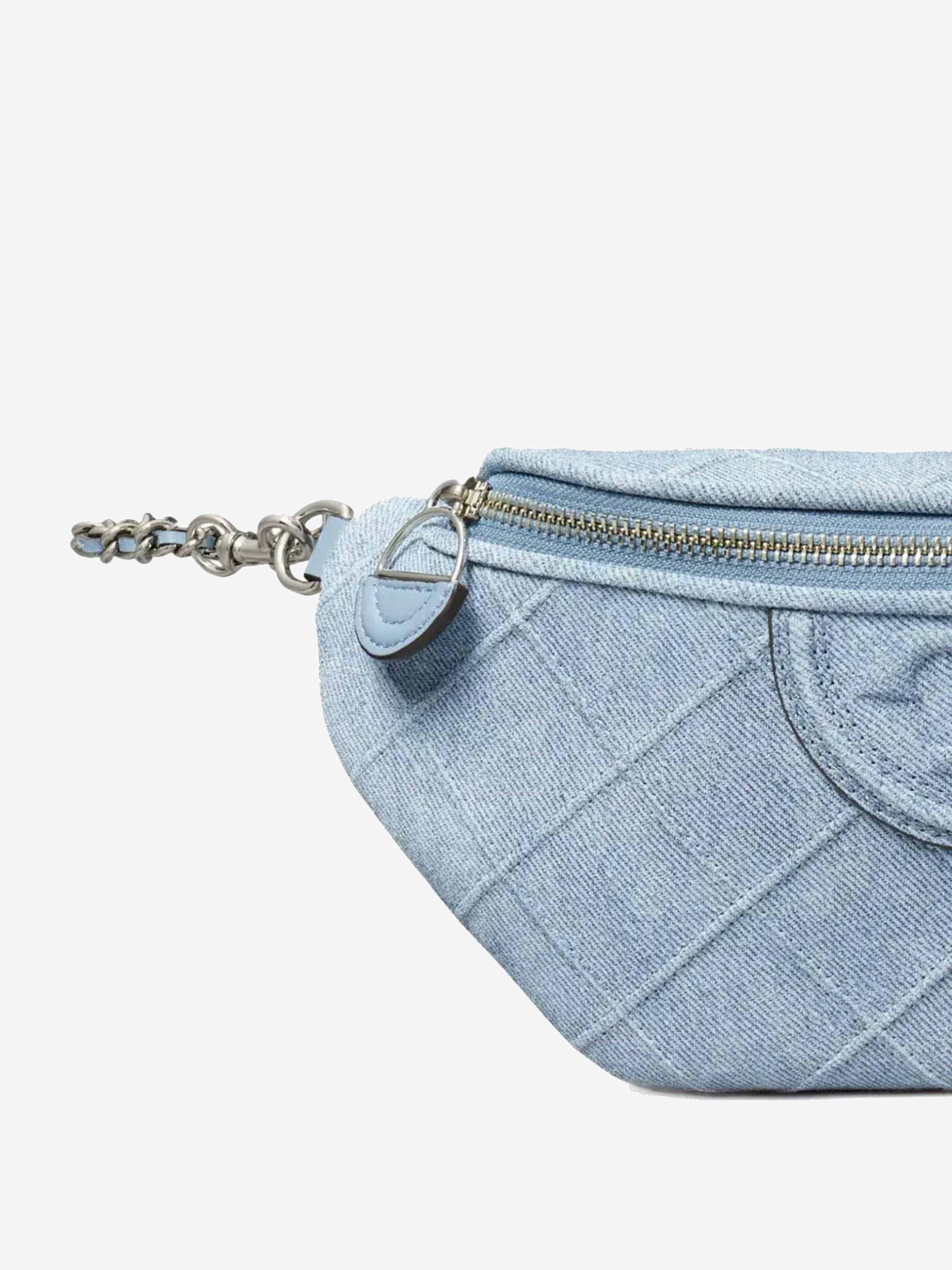 Close up of the blue bag, showing texture of the suede fabric