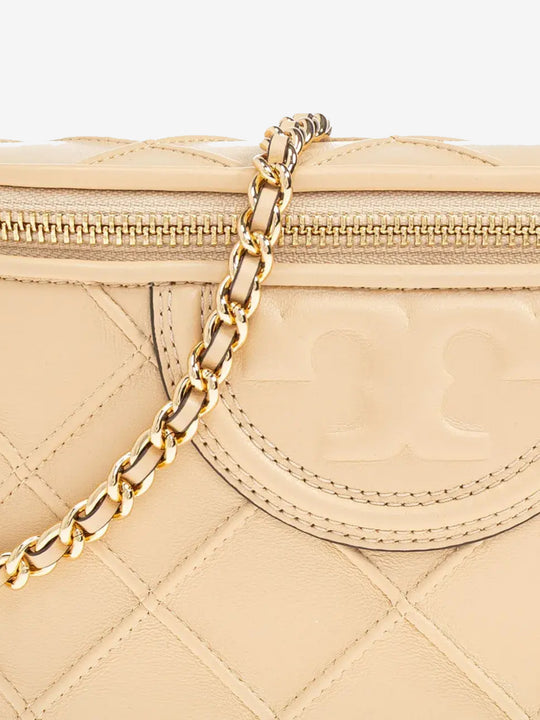Close up of the yellow bag, showing texture of the leather fabric