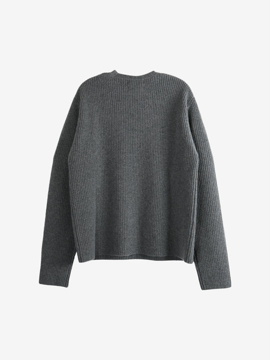 Grey knitwear, back view