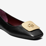 Close up of black flat, showing texture of the leather fabric