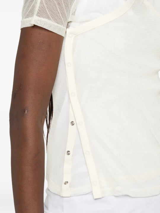 Tan top worn by a person, showing the top fit