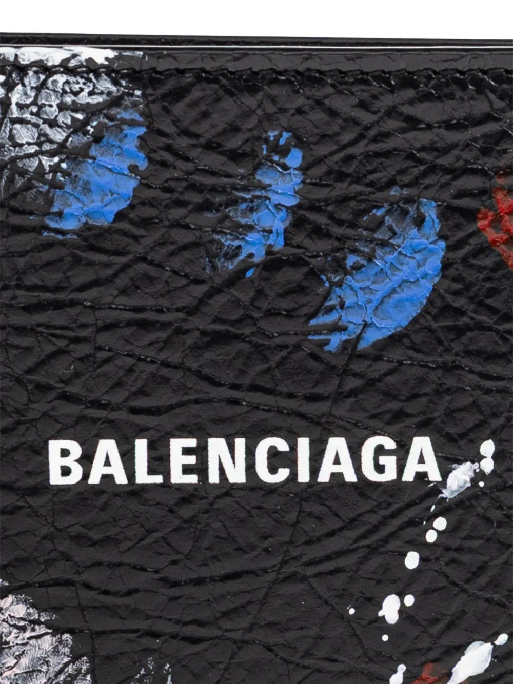 Close up of the black wallet, showing texture of the lamb skin