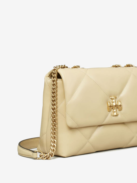 Close up of white bags, showing texture of the leather fabric