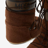 Close up of the brown boot, showing texture of the acrylic/  polyester/ polyvinyl chloride fabric