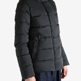 Black jacket worn by a person, showing the jacket's fit